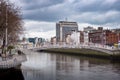 River Liffey, Ha`Penny Bridge and Heineken Building / OÃ¢â¬â¢Connell Bridge House in Dublin, Ireland